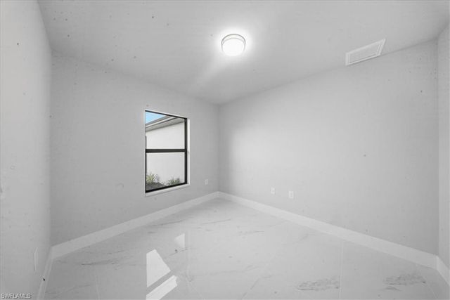 711 Roosevelt AVE, Lehigh Acres, FL 33936