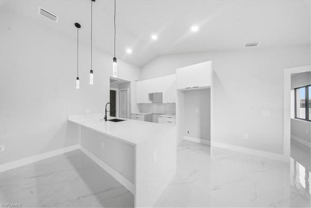 711 Roosevelt AVE, Lehigh Acres, FL 33936