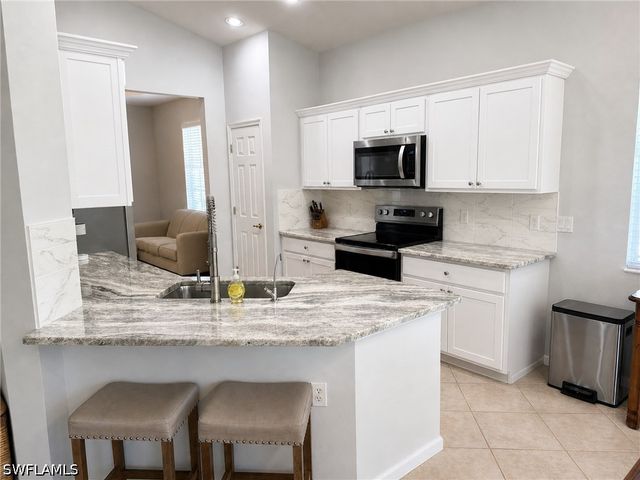 19081 RIDGEPOINT DR 201, Estero, FL 33928