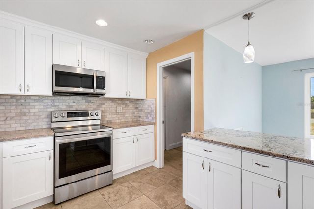 556 MIMOSA AVENUE NW, Port Charlotte, FL 33952