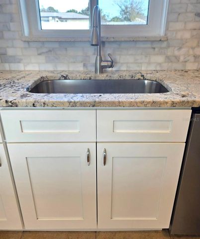 556 MIMOSA AVENUE NW, Port Charlotte, FL 33952