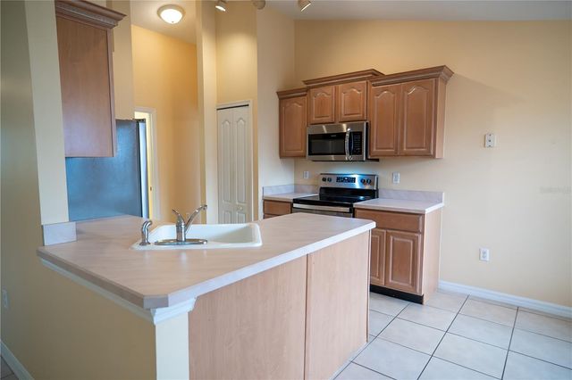 8740 SPYGLASS LOOP, Clermont, FL 34711