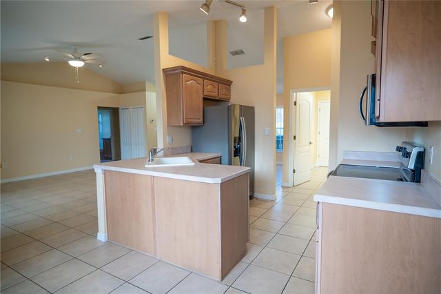 8740 SPYGLASS LOOP, Clermont, FL 34711