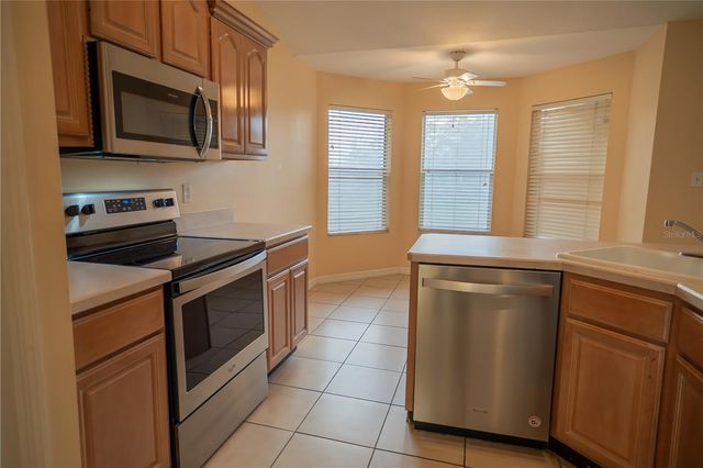 8740 SPYGLASS LOOP, Clermont, FL 34711