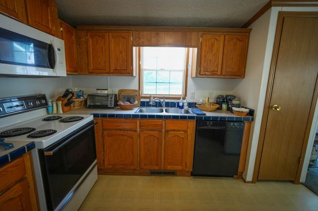 9339 Maple Hill Road, Howard City, MI 49329