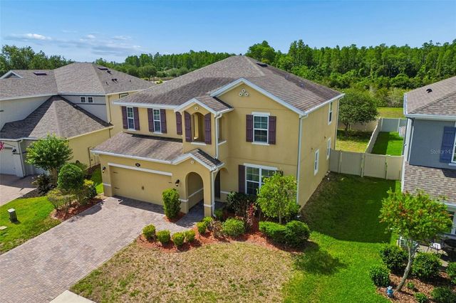 1192 MULTIFLORA LOOP, Lutz, FL 33558