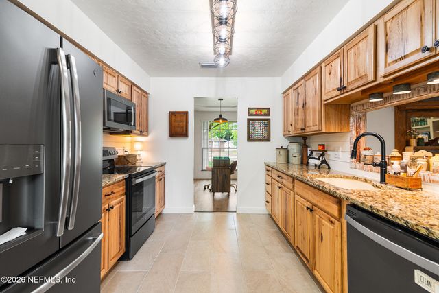 8208 WORM WOOD Road, Jacksonville, FL 32210