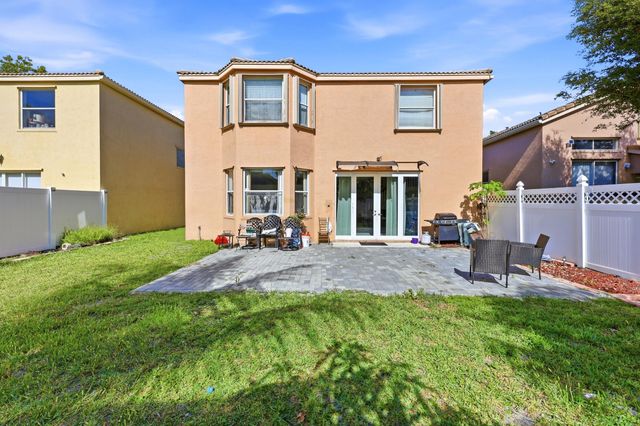 1327 Isleworth Court, Royal Palm Beach, FL 33411