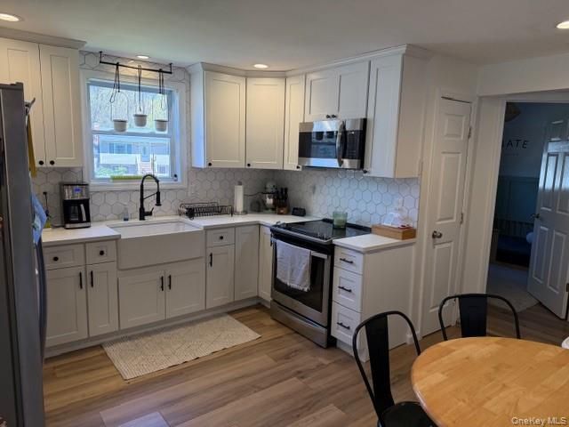 10 Hollingsworth Place, Centereach, NY 11720