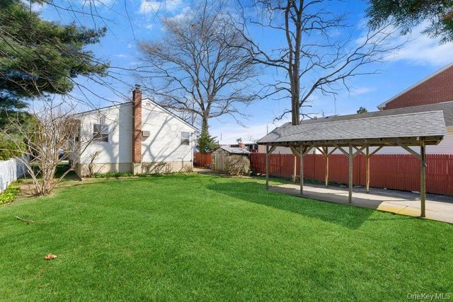 15 Woodlawn Avenue, Valley Stream, NY 11581