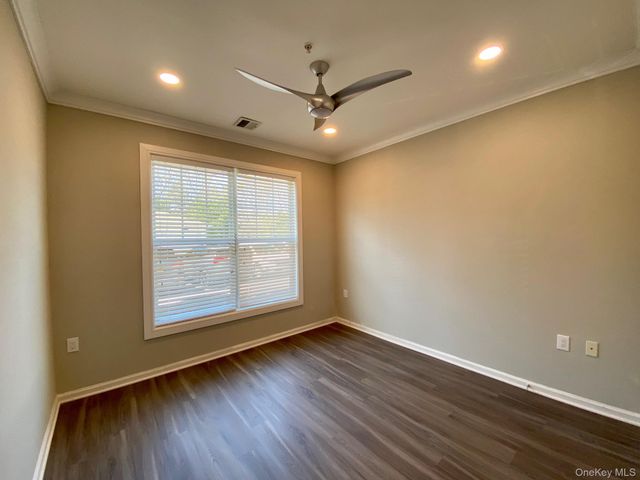 1 Charles Pond Drive 9-911, Coram, NY 11727