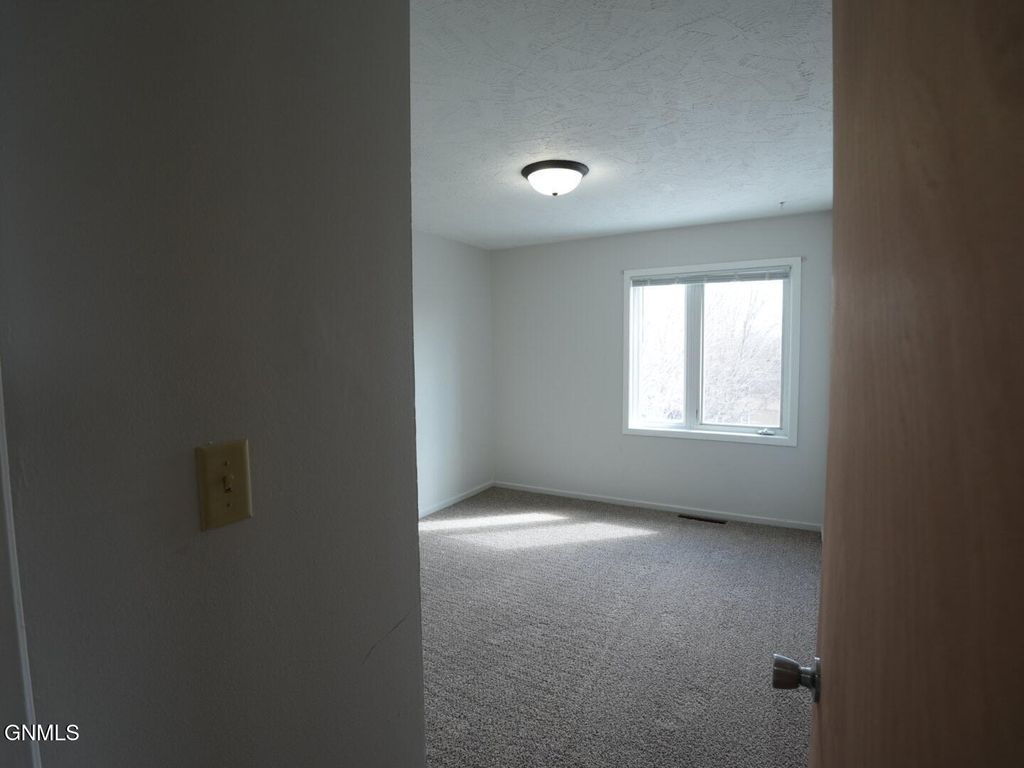 303 Highland Drive W, Williston, ND 58801 photo 14