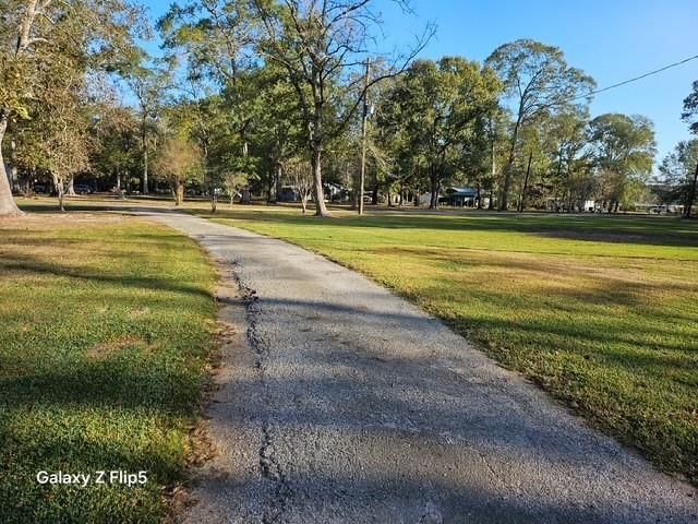 21000 Buck Knoll Road, Splendora, TX 77372