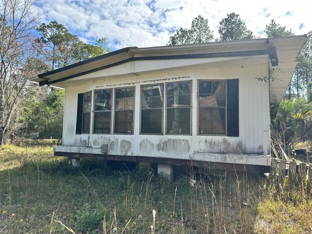 1516 AVOCADO BOULEVARD, Bunnell, FL 32110