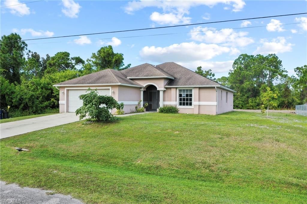 723 Newell ST E, LEHIGH ACRES, FL 33974 — exterior