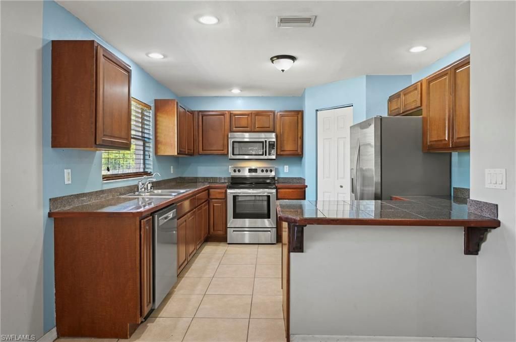 723 Newell ST E, LEHIGH ACRES, FL 33974 — photo 3