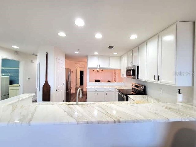 7296 MARATHON DRIVE 404, Seminole, FL 33777