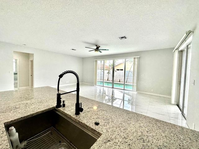 1219 Baycourt Isle, Greenacres, FL 33413