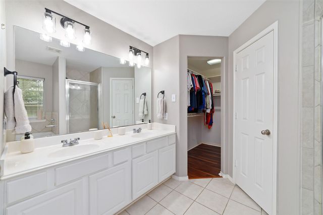 13806 Arapaho Shadow Court, Cypress, TX 77429