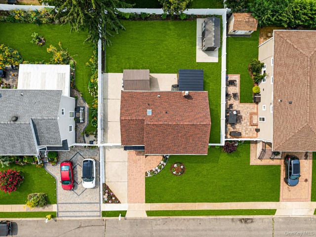 95 Colonial Drive, Massapequa, NY 11758