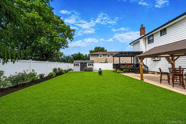 95 Colonial Drive, Massapequa, NY 11758