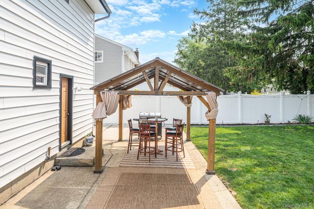 95 Colonial Drive, Massapequa, NY 11758