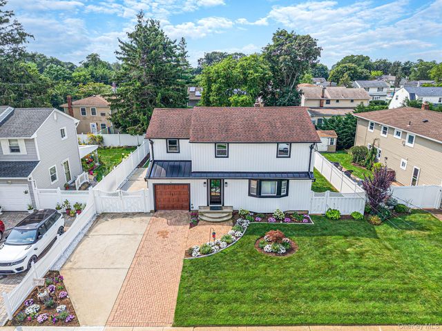 95 Colonial Drive, Massapequa, NY 11758