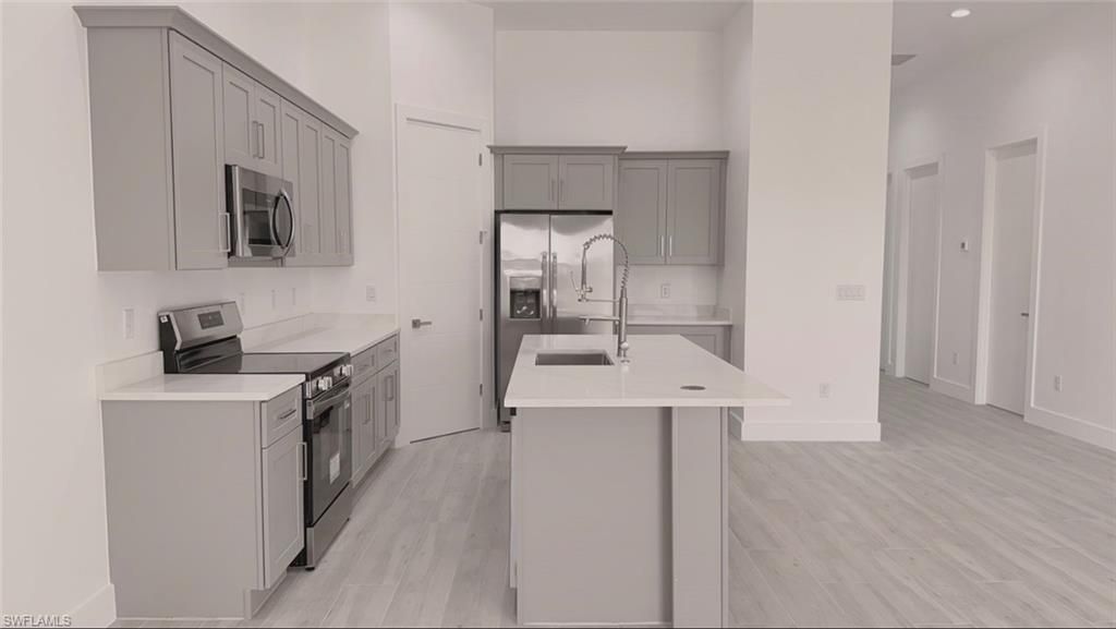 Image 5 of property listing at 2102/2104 NE 16th TER, Cape Coral, FL 33909