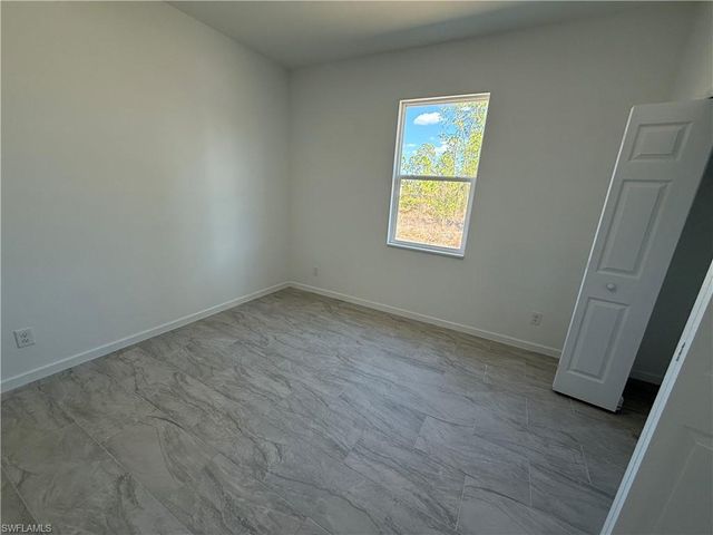 1115 Cove ST E, Lehigh Acres, FL 33974