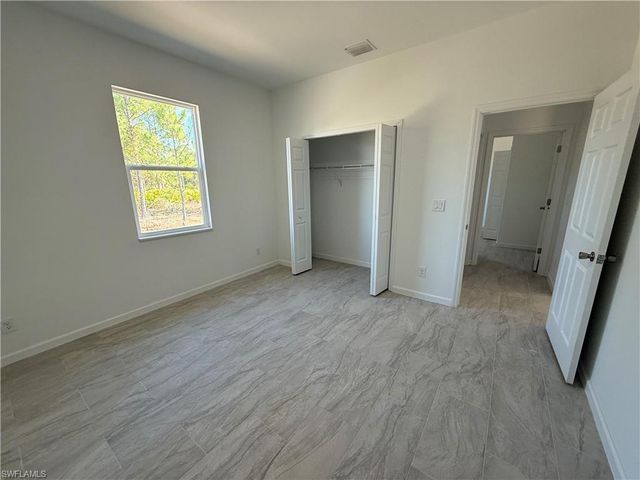 1115 Cove ST E, Lehigh Acres, FL 33974