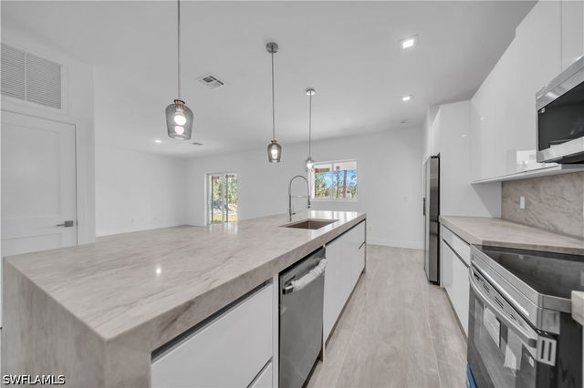 1142 Dutchess ST E, Lehigh Acres, FL 33974