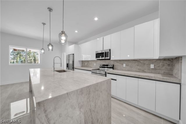 1142 Dutchess ST E, Lehigh Acres, FL 33974