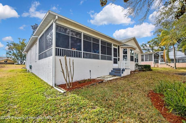 8015 Hidden Hills Drive, Spring Hill, FL 34606