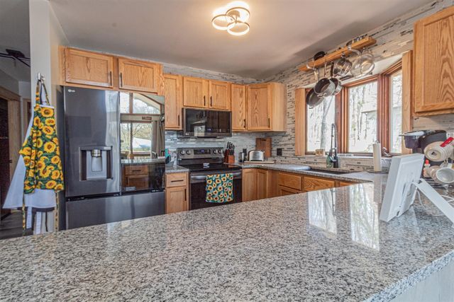 9530 Golf Port Drive, Canadian Lakes, MI 49346