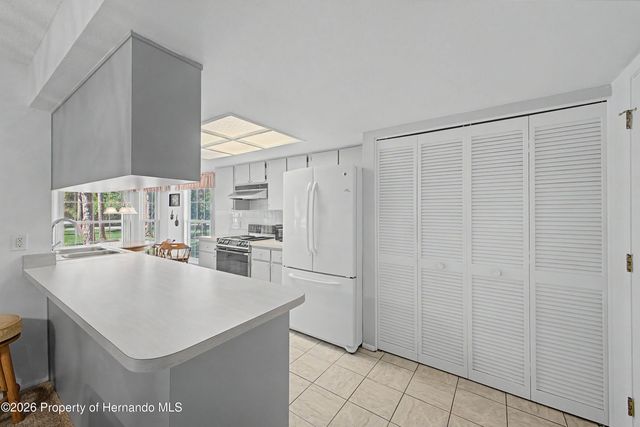 7088 Crown Oaks Drive, Spring Hill, FL 34606