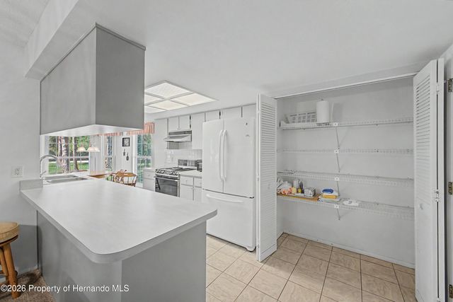 7088 Crown Oaks Drive, Spring Hill, FL 34606