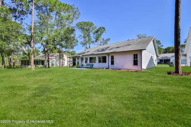 7088 Crown Oaks Drive, Spring Hill, FL 34606