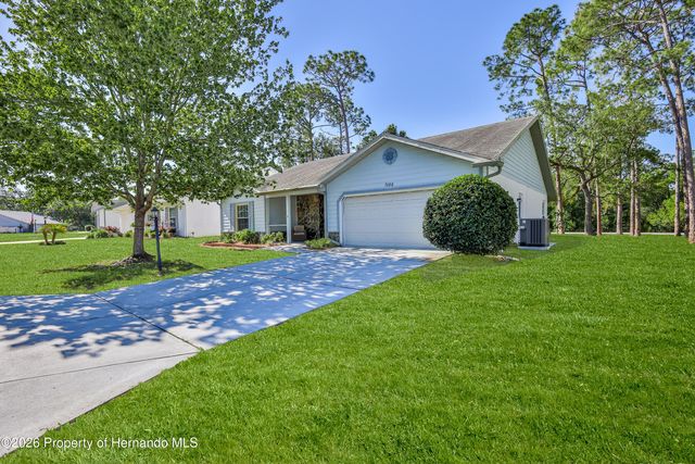 7088 Crown Oaks Drive, Spring Hill, FL 34606