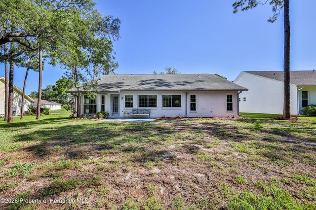 7088 Crown Oaks Drive, Spring Hill, FL 34606