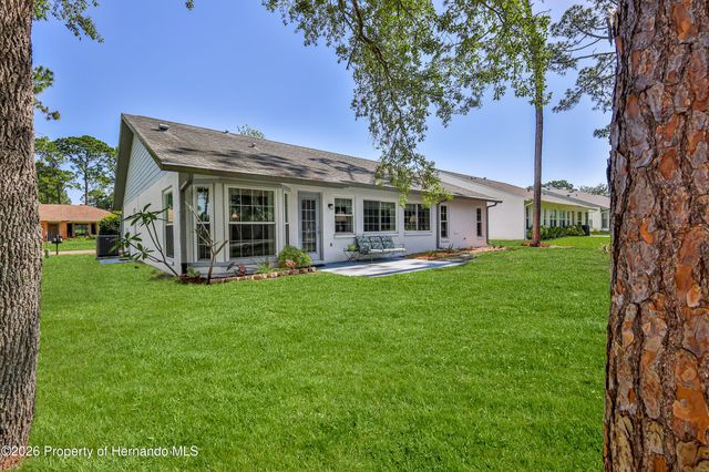 7088 Crown Oaks Drive, Spring Hill, FL 34606