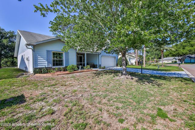 7088 Crown Oaks Drive, Spring Hill, FL 34606