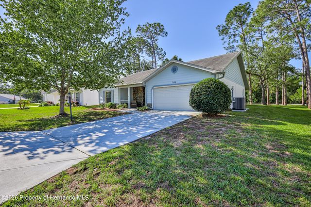 7088 Crown Oaks Drive, Spring Hill, FL 34606