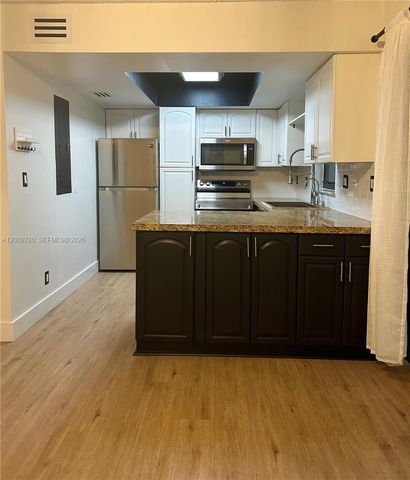 10 Laredo Pl NA, Davie, FL 33324