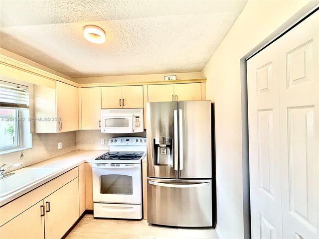 3481 Briar Bay Boulevard 206, West Palm Beach, FL 33411