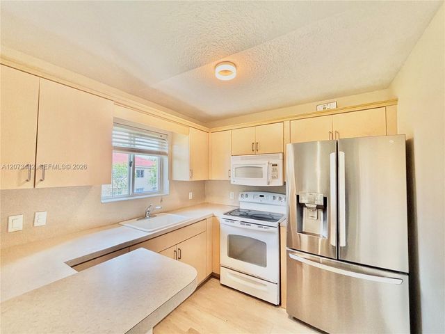 3481 Briar Bay Boulevard 206, West Palm Beach, FL 33411