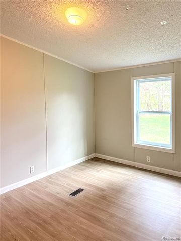 7033 E Mount Morris Road, Otisville, MI 48463