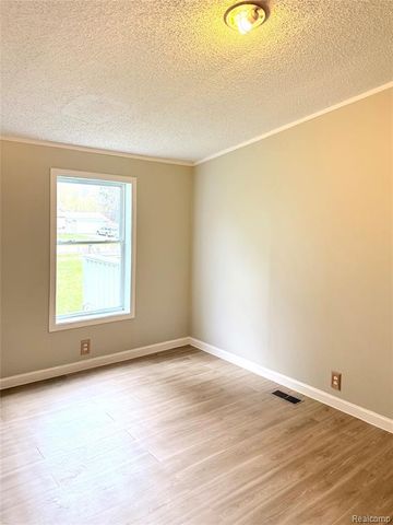 7033 E Mount Morris Road, Otisville, MI 48463