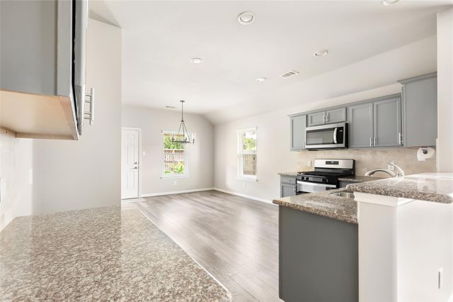10331 Whisper Bluff Drive, Humble, TX 77396
