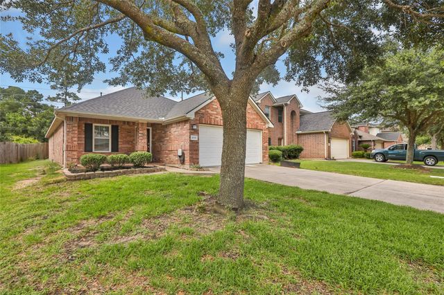10331 Whisper Bluff Drive, Humble, TX 77396