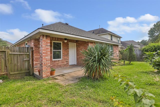 10331 Whisper Bluff Drive, Humble, TX 77396